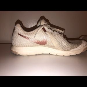 white nike shoes with gold swoosh